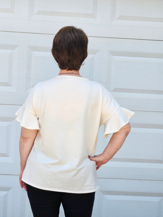 Animal Print Contrast Ruffled Sleeved Top in Cream