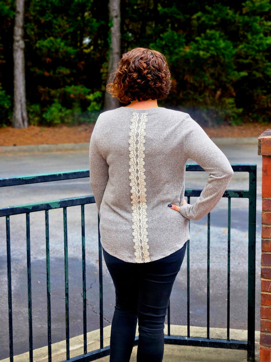 Long Sleeved Knit Top with a Lace Patch Back Detail in Taupe