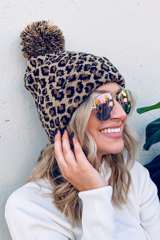Pom Pom Leopard Print Beanie in Taupe