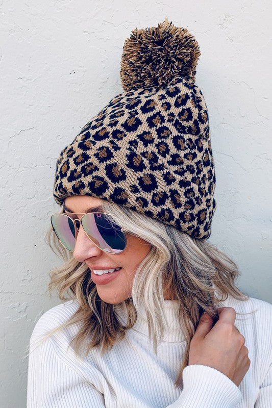 Pom Pom Leopard Print Beanie in Taupe