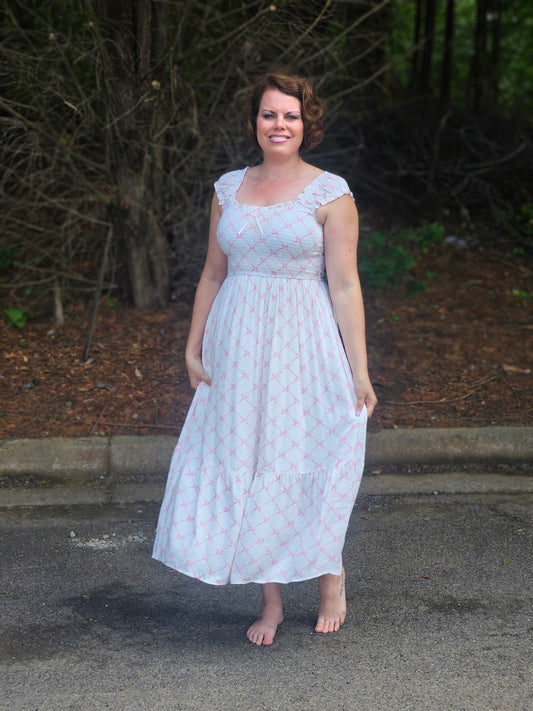 Bow Pattern Ruched Sleeve Smocked Midi Dress in Pink