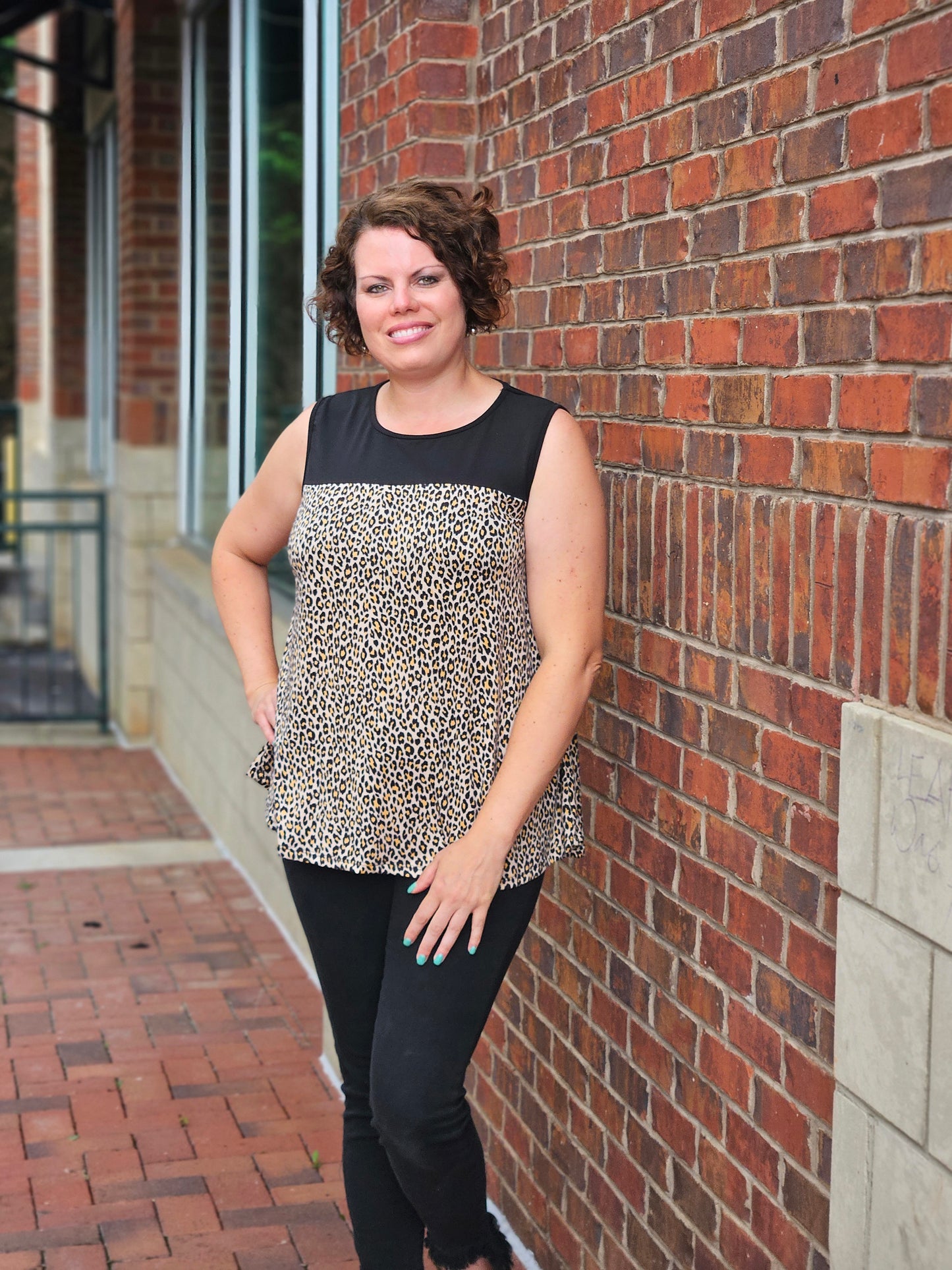 Animal Print Sleeveless Swing Top in Black and Taupe