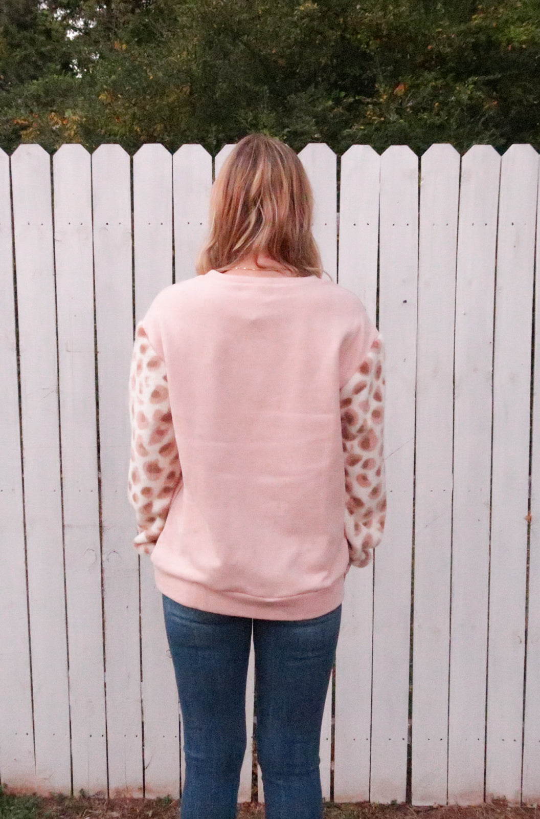 Animal Print Faux Fur Contrast Sleeve Pull Over Top in Dusty Pink