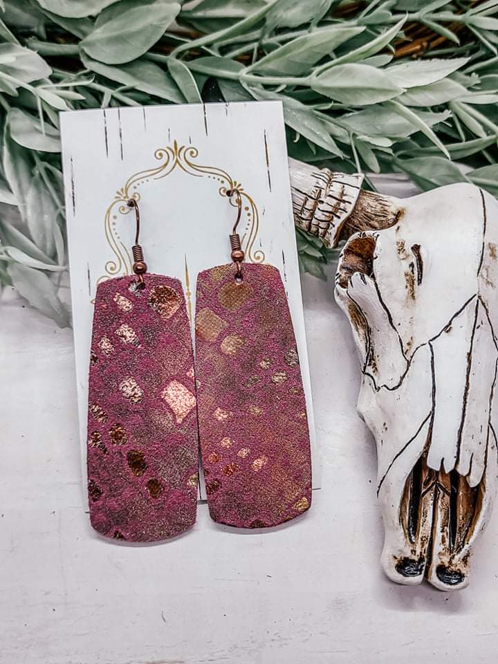 These earrings are a great way to add some fun to your outfit! They are made of nickel and lead free hardware. These earrings are also made of hypoallergenic settings and surgical steel posts with clear backings.