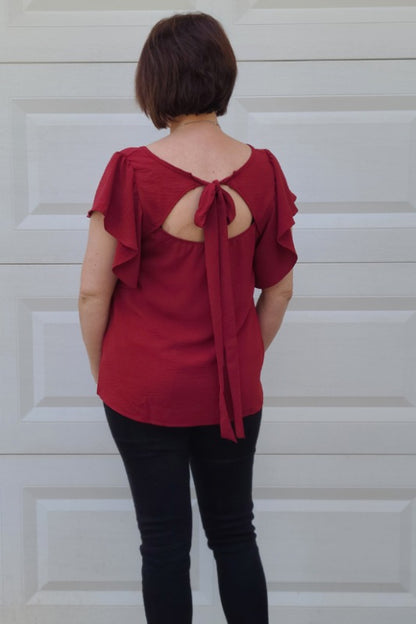 Flutter Sleeve Tied Bow Back Detail Top in Ruby