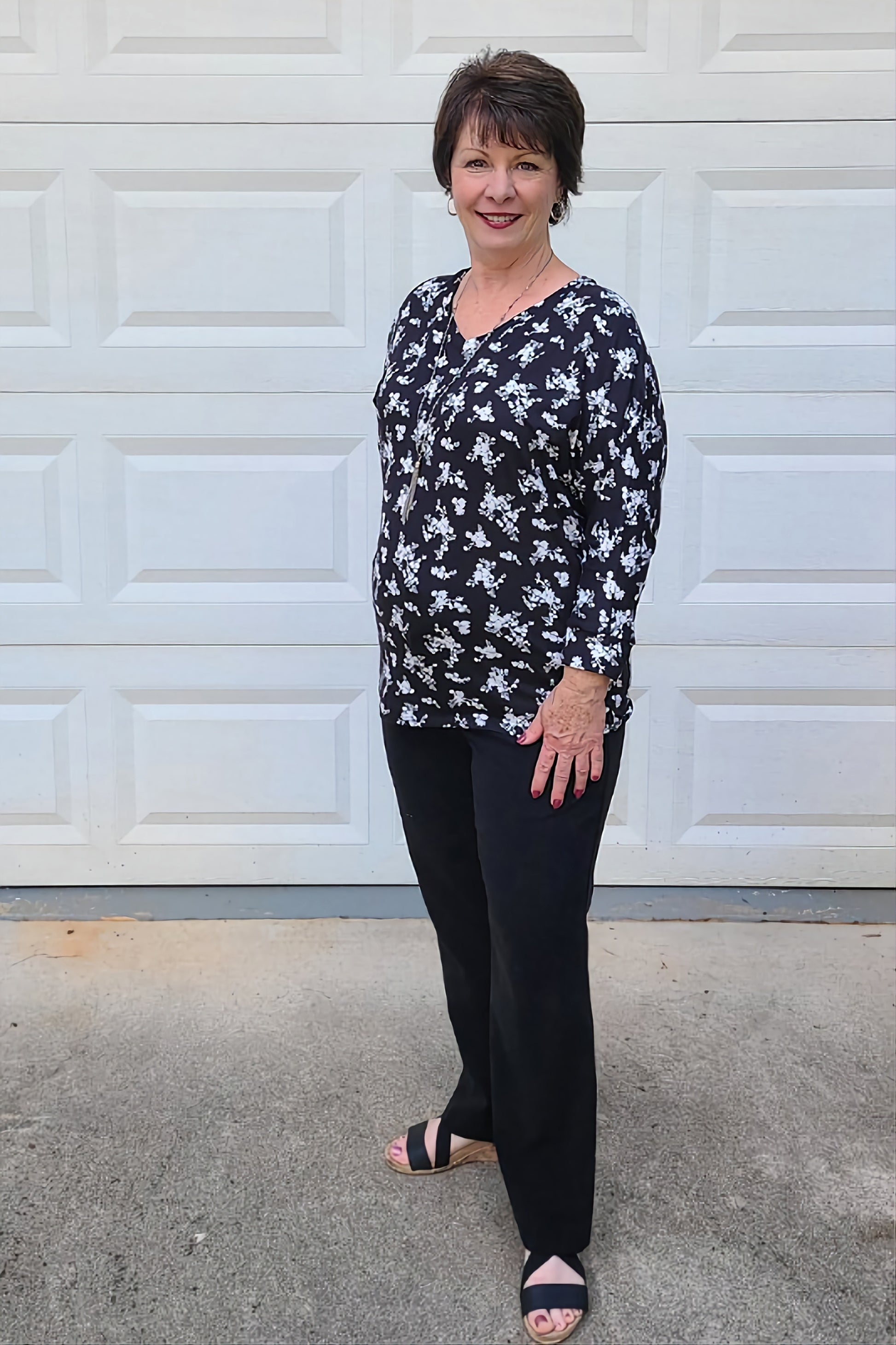 This adorable three-quarter sleeve dolman style top is so soft and cute! A classic v-neck and a flattering style completes a romantic look.