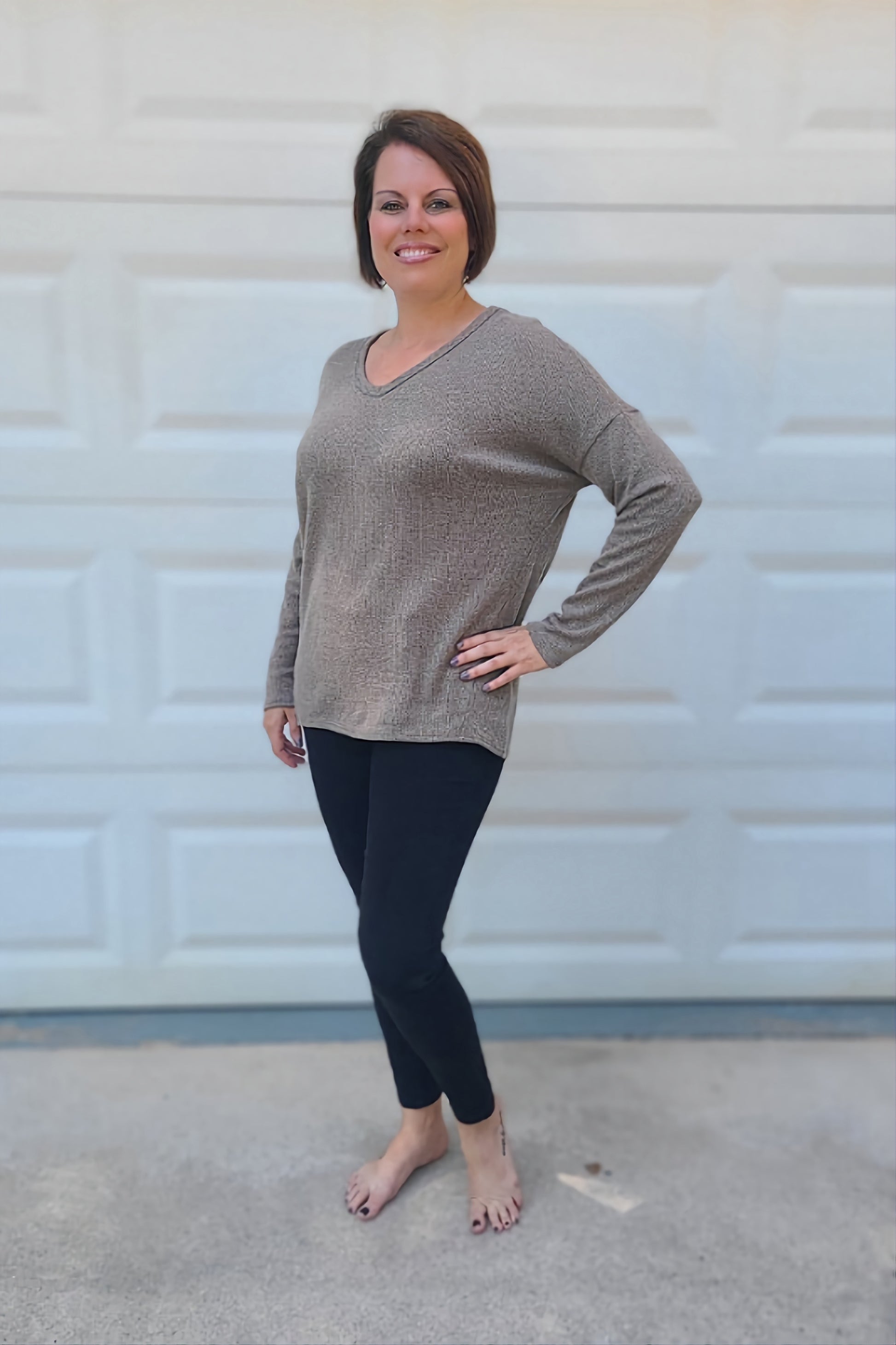 Keep your look casual with this everyday lightweight sweater! You’ll add some simple style to your day with details like a v-neckline, dropped shoulder, dolman sleeves, and it is so soft and comfortable.