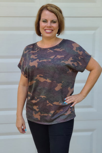 This top is so cute! It is the perfect transition piece into fall and can be worn with your favorite pair of jeans. It features a round neckline, a twisted open back with a round hemline and is so soft and comfortable.