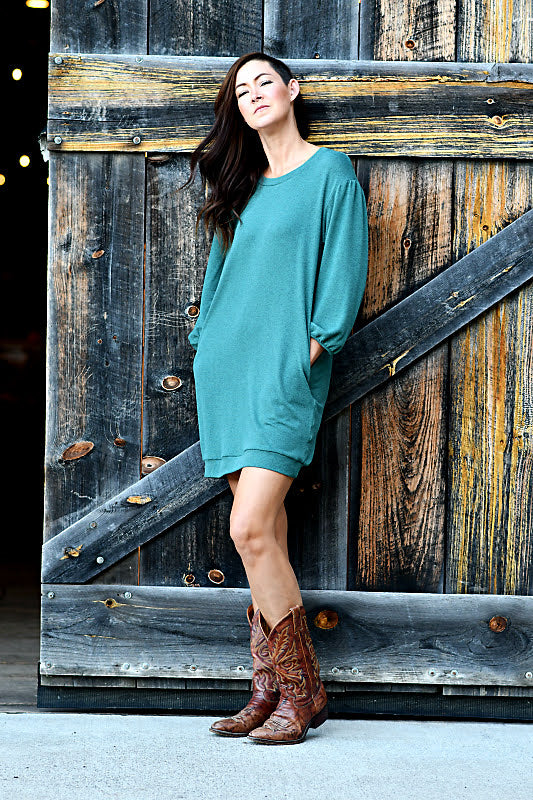 This adorable sweater dress is the perfect transitional dress for the change of the seasons! The details include a round neck, 3'4" sleeves and is so soft and comfortable.