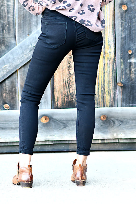 Mid Rise Pull On Crop Skinny Jeans in Black