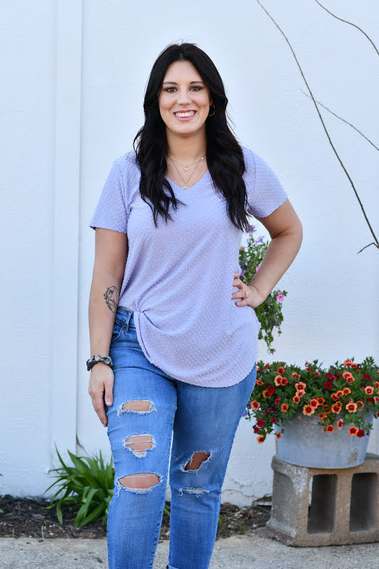 Swiss dot is trending big this season along with all the feminine details, and this top has it all! The details include a v-neckline, short sleeves and is so soft and comfortable.
